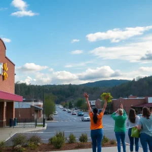 Community members celebrating the reopening of Walmart in Asheville after Hurricane Helene