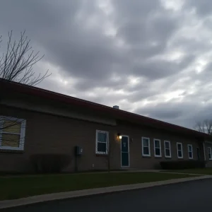 Exterior of Asheville Academy building with cloudy sky