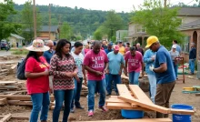Community members collaborating on recovery efforts in Asheville post-hurricane