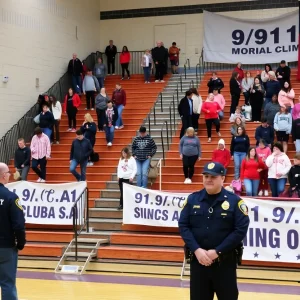 Participants honoring 9/11 victims during a memorial stair climb event