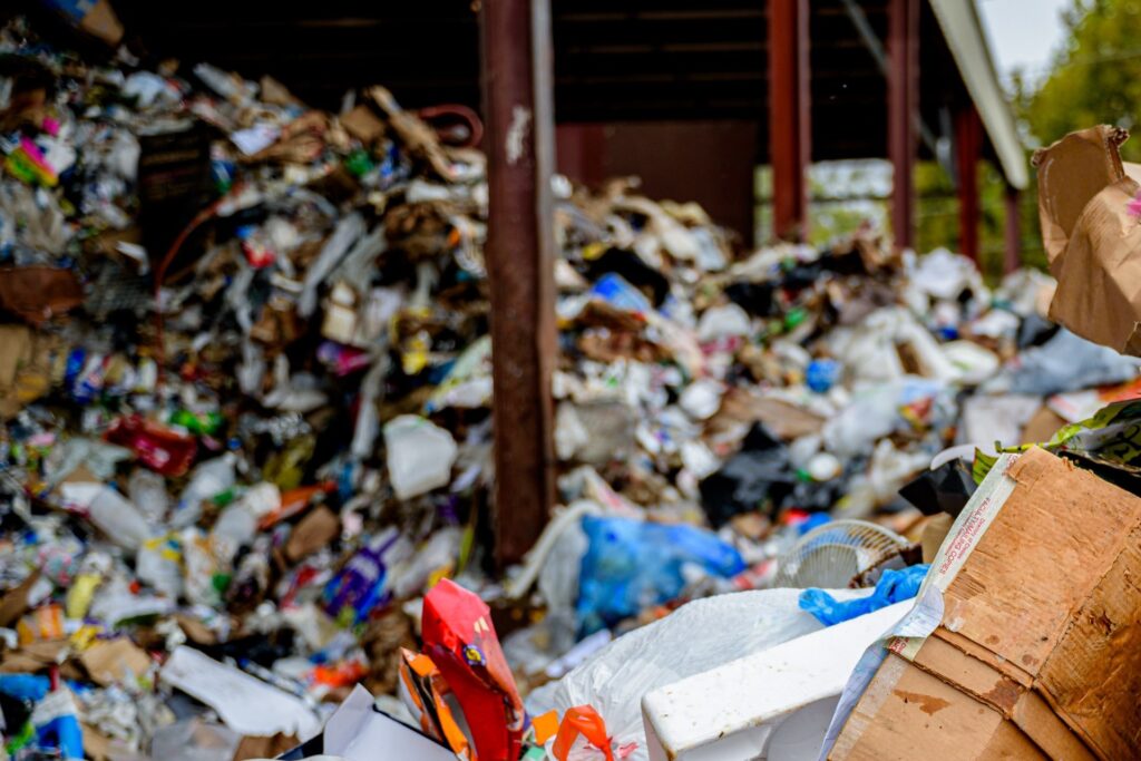 Household trash and recyclables piled at a North Carolina recycling sorting facility